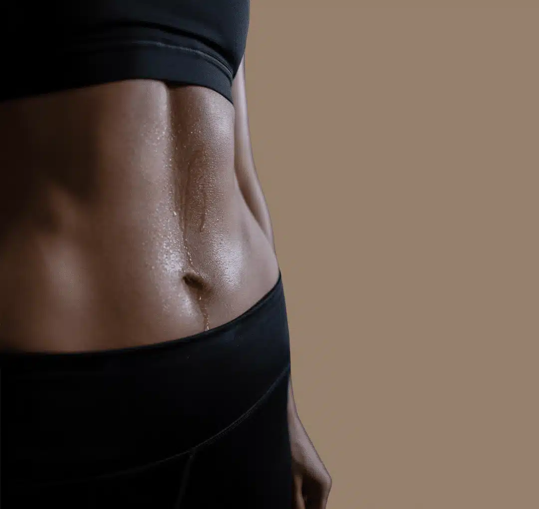 A woman's stomach is shown in black and brown.